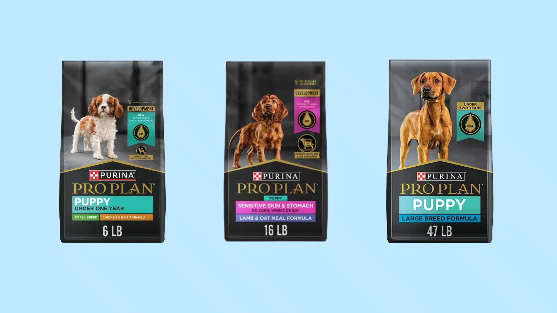 Three Purina Pro Plan puppy dry dog food bags for small breed, sensitive skin and stomach, and large breed formulas