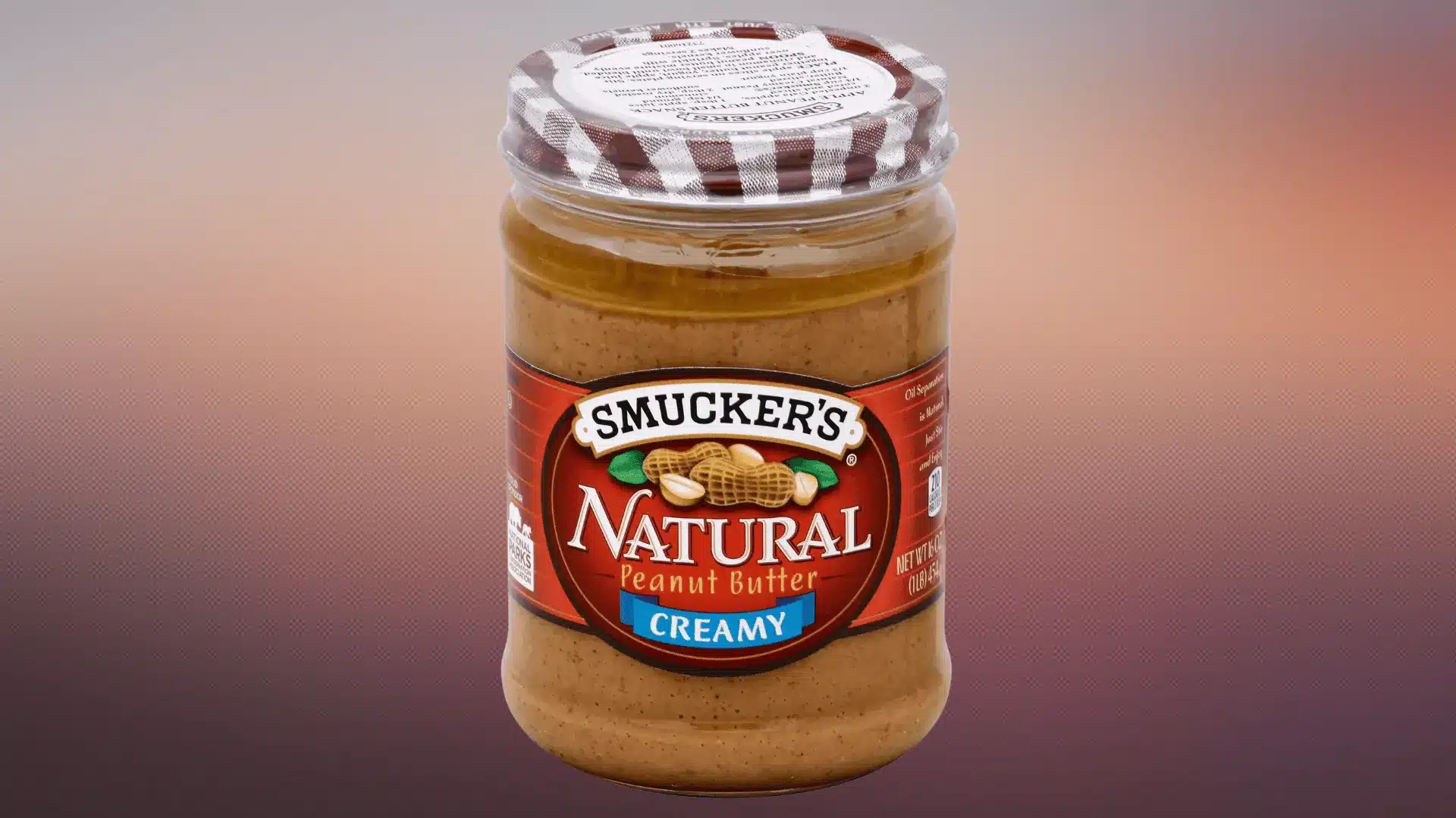 Small white flowers painted on a mauve base create a soft manicure on a almond shape nails