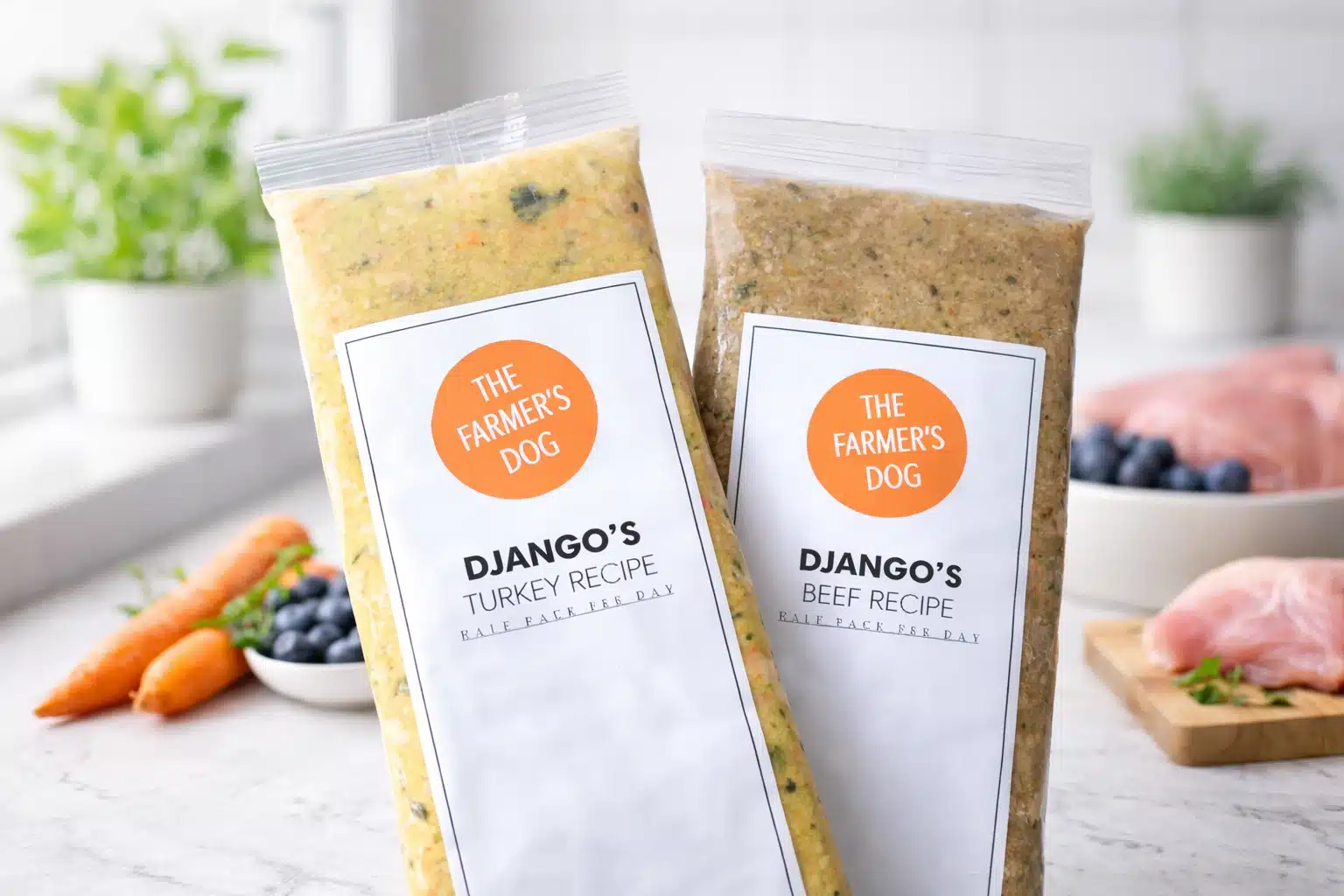 The Farmer’s Dog fresh dog food turkey and beef recipes in sealed packs with raw ingredients on kitchen counter