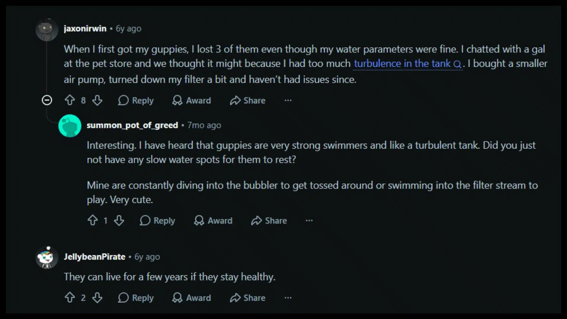 Reddit thread discussing guppy care, water turbulence, swimming behavior, and lifespan in aquarium tanks