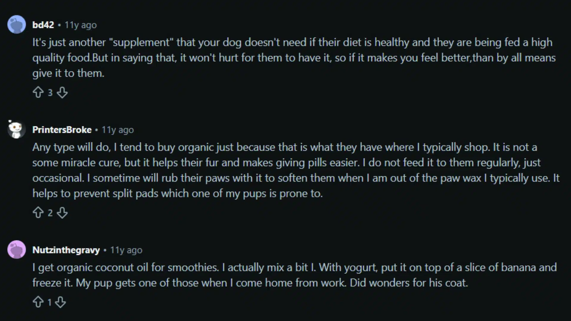 Reddit comments discussing coconut oil for dogs, with mixed views on benefits and necessity
