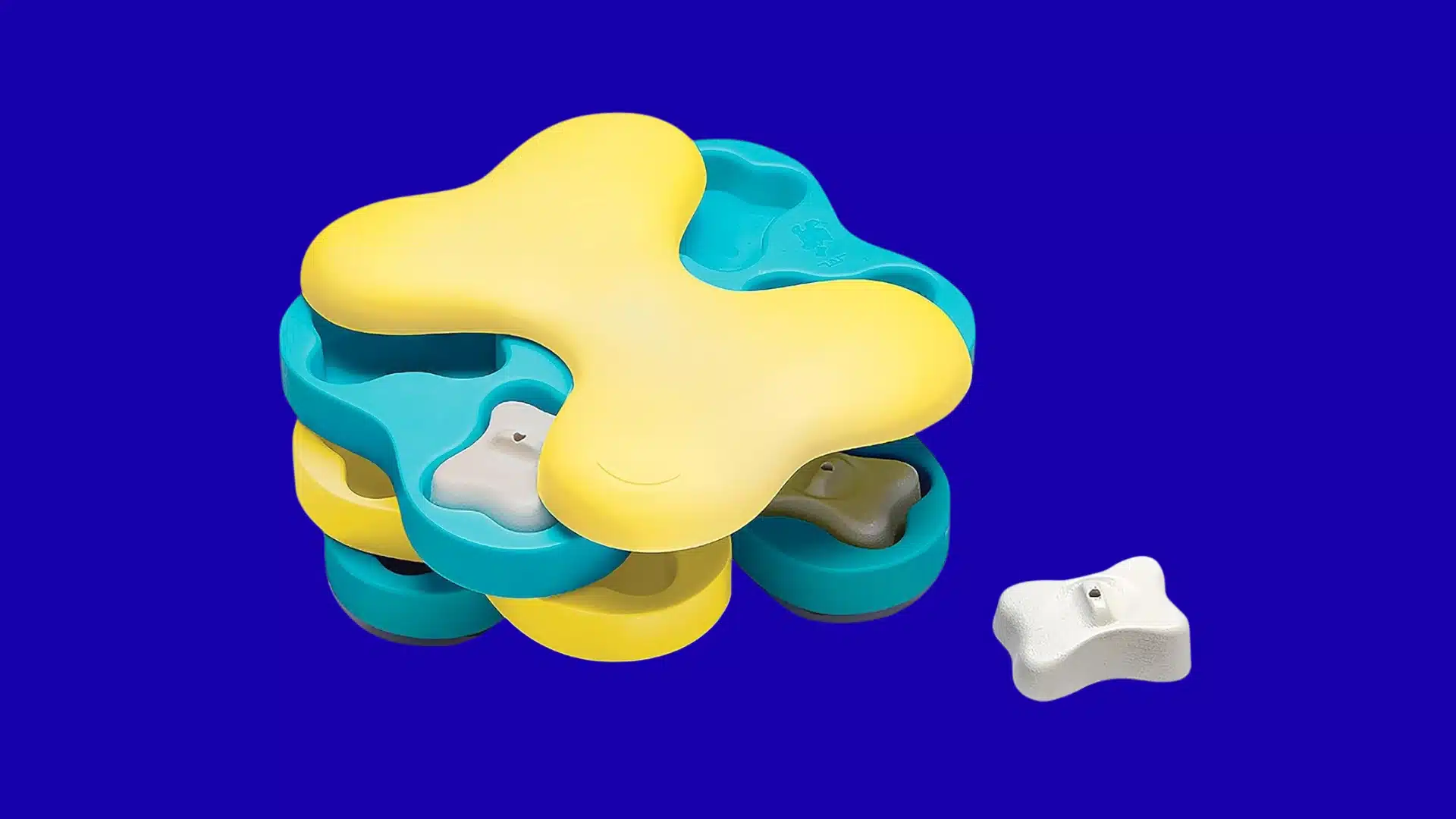 Yellow and teal dog puzzle toy with bone treats