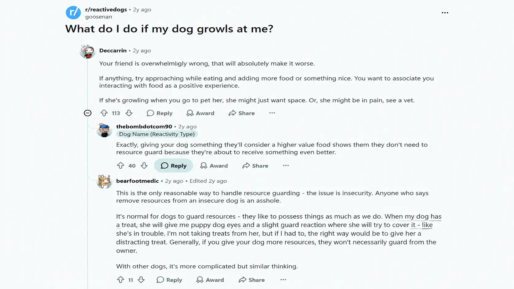 reddit discussion showing dog growling advice from owners about handling resource guarding behavior and canine communication